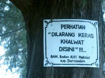 A sign at Lapangan Tugu, Banda Aceh: ‘Attention: khalwat is strictly prohibited here.’ newman2_340.jpg